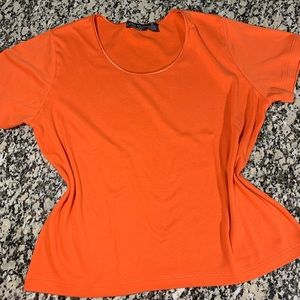 Extra Touch International top